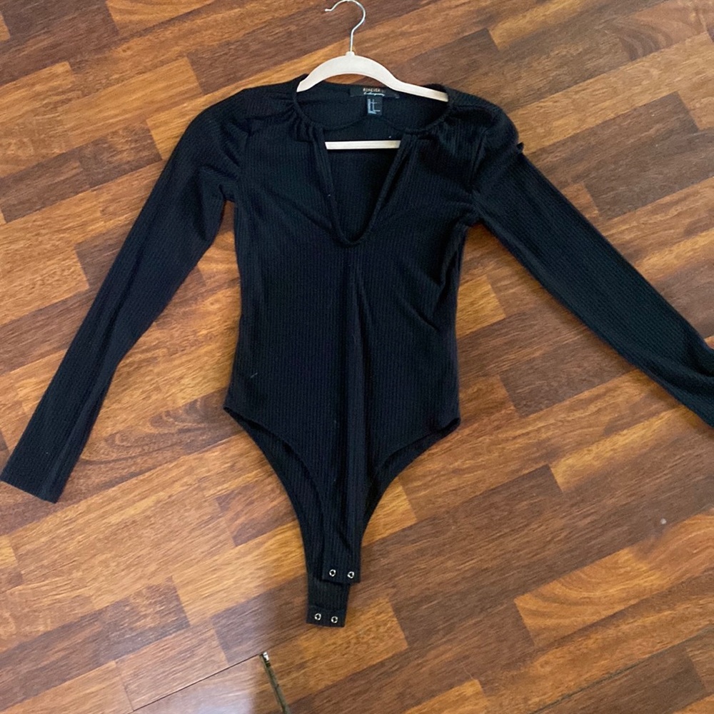 Women’s black body suit